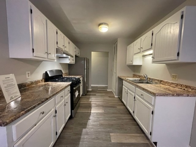 10 Ingleshire Road Montgomery, IL 60538 - Photo 10 of 26 a large kitchen with stainless steel appliances granite countertop a lot of counter space and wooden floors