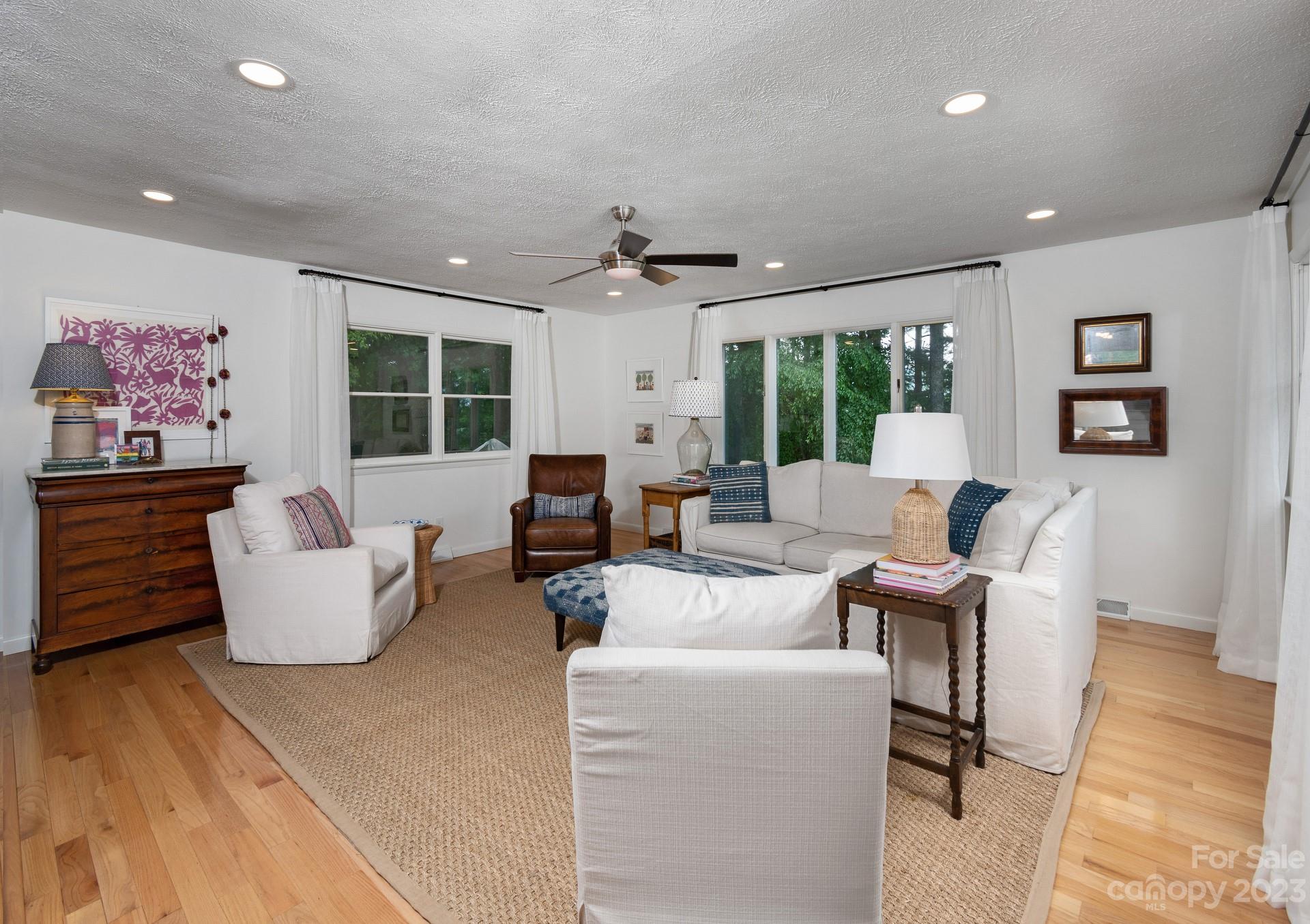 298 Camp Rock Road, Unit 14 Boone, NC 28607 - Photo 15 of 45 a living room with furniture and a large window