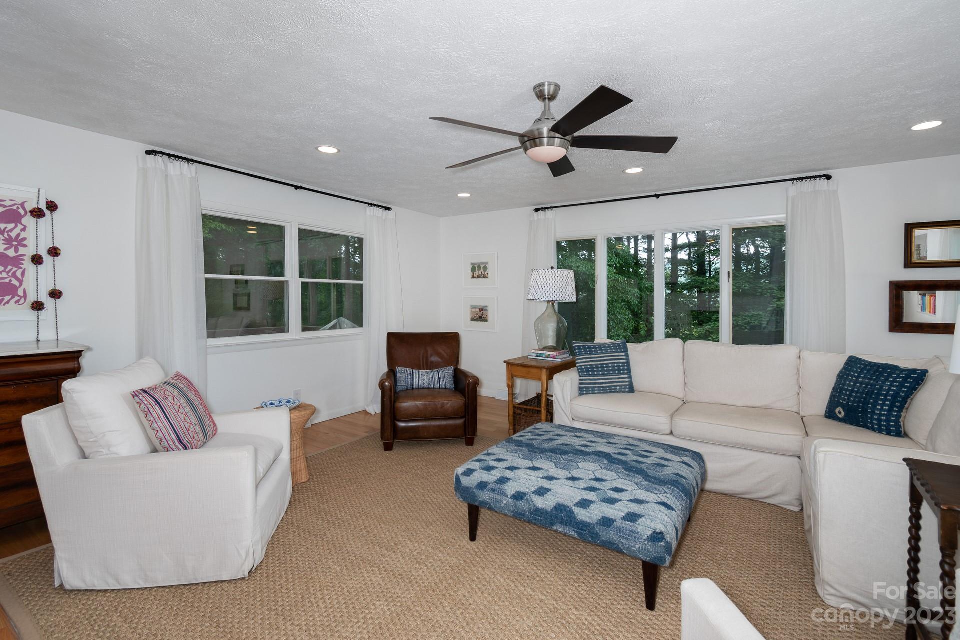 298 Camp Rock Road, Unit 14 Boone, NC 28607 - Photo 22 of 45 a living room with furniture and a large window