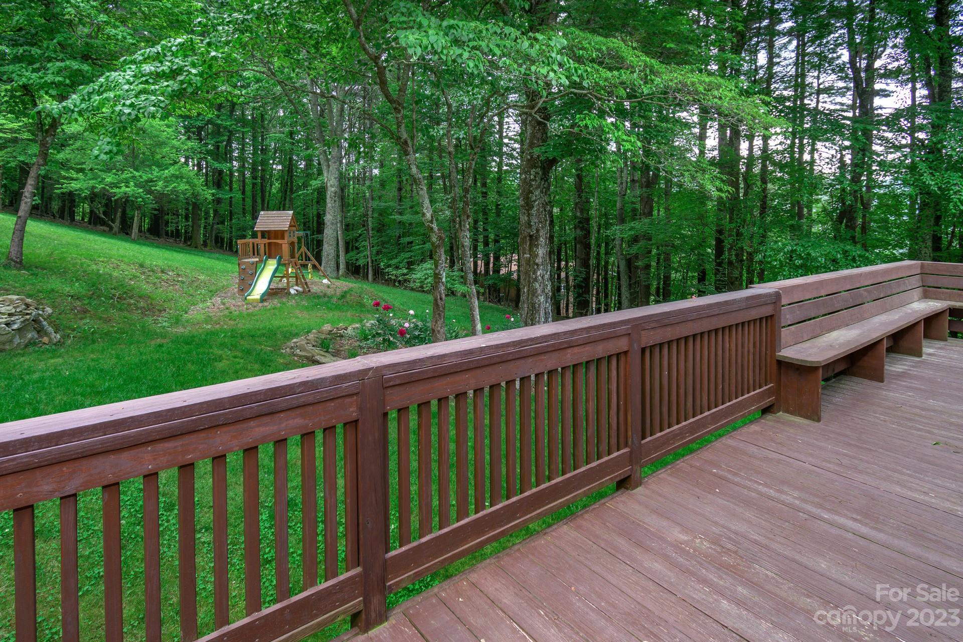 298 Camp Rock Road, Unit 14 Boone, NC 28607 - Photo 26 of 45 a view of a deck with a yard