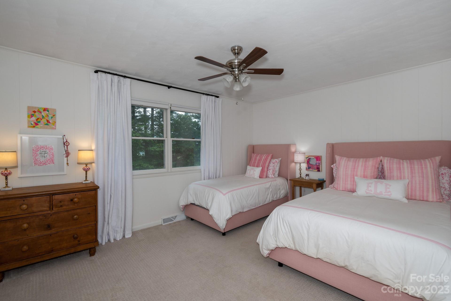 298 Camp Rock Road, Unit 14 Boone, NC 28607 - Photo 28 of 45 a bedroom with two beds and painting on the wall