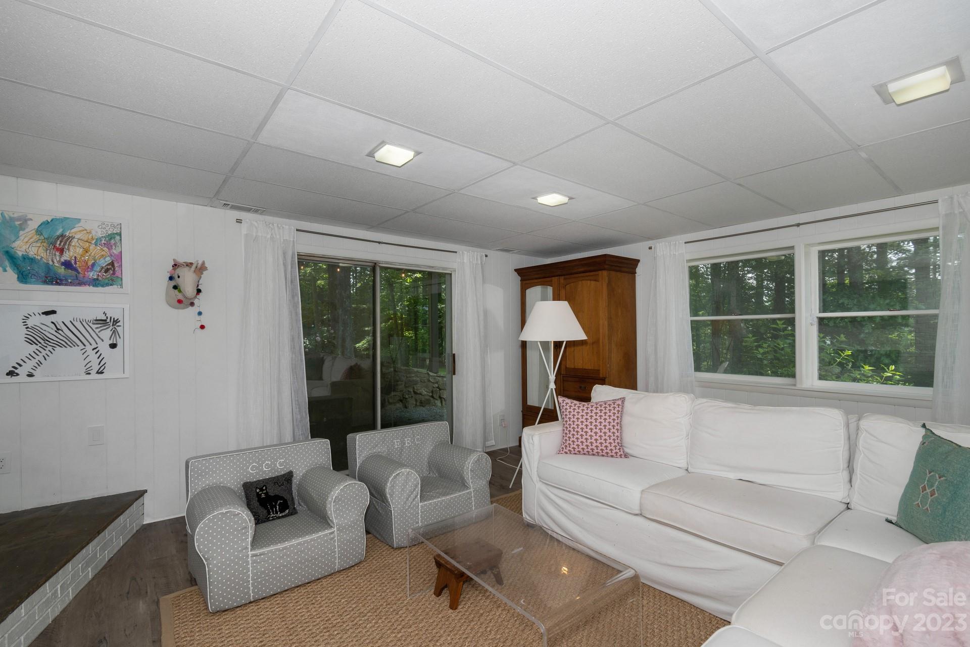 298 Camp Rock Road, Unit 14 Boone, NC 28607 - Photo 36 of 45 a living room with furniture and a large window