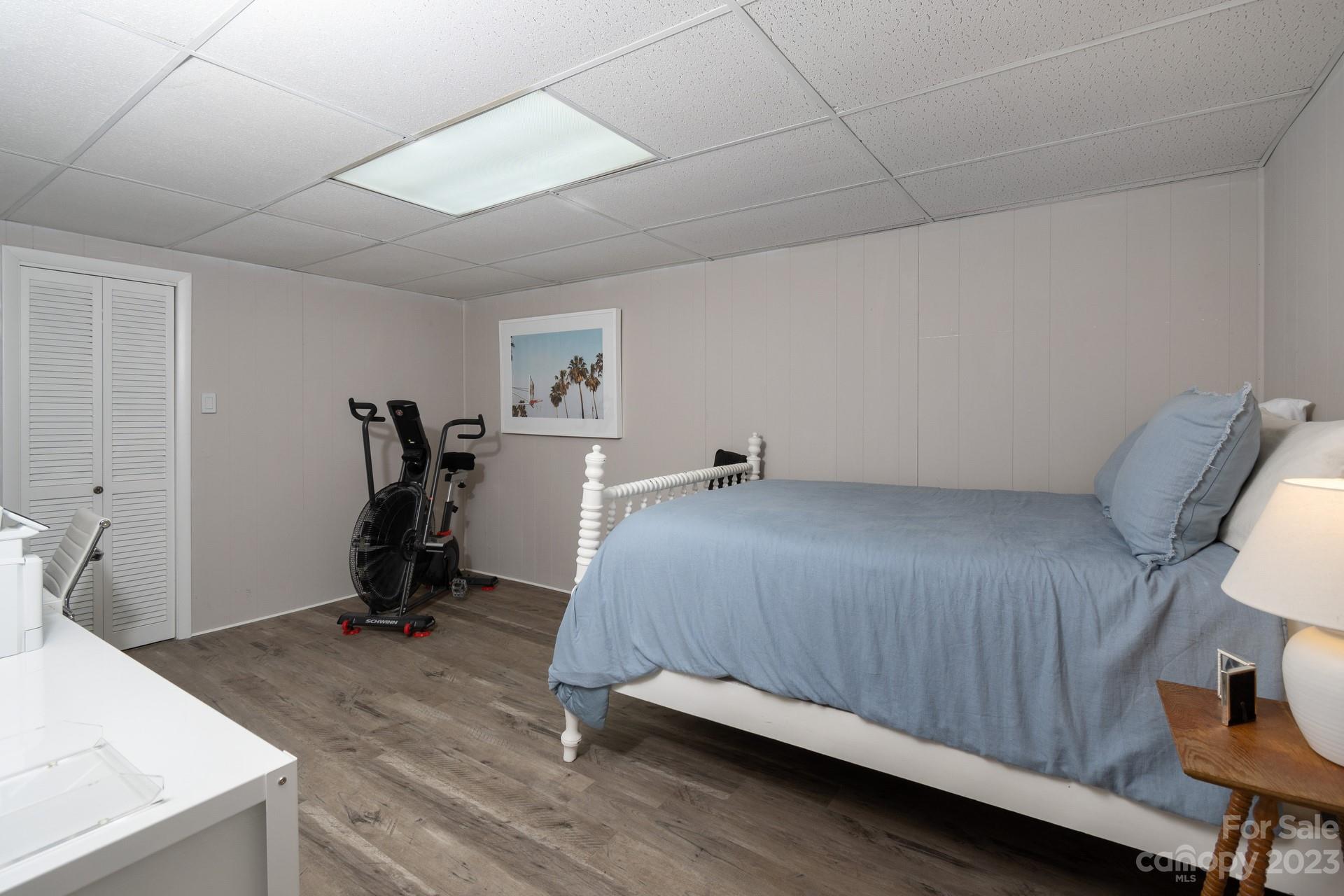 298 Camp Rock Road, Unit 14 Boone, NC 28607 - Photo 38 of 45 a bedroom with a bed and a table in it