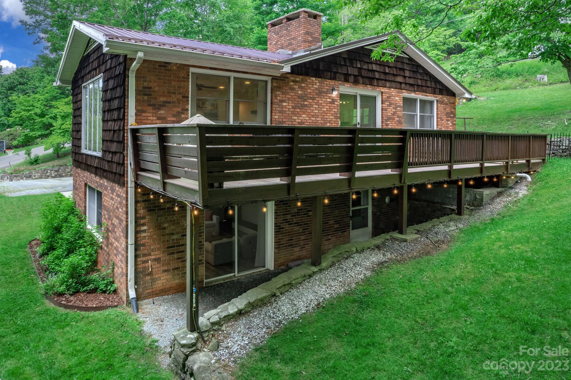 298 Camp Rock Road, Unit 14 Boone, NC 28607 - Photo 5 of 45 a view of house with backyard