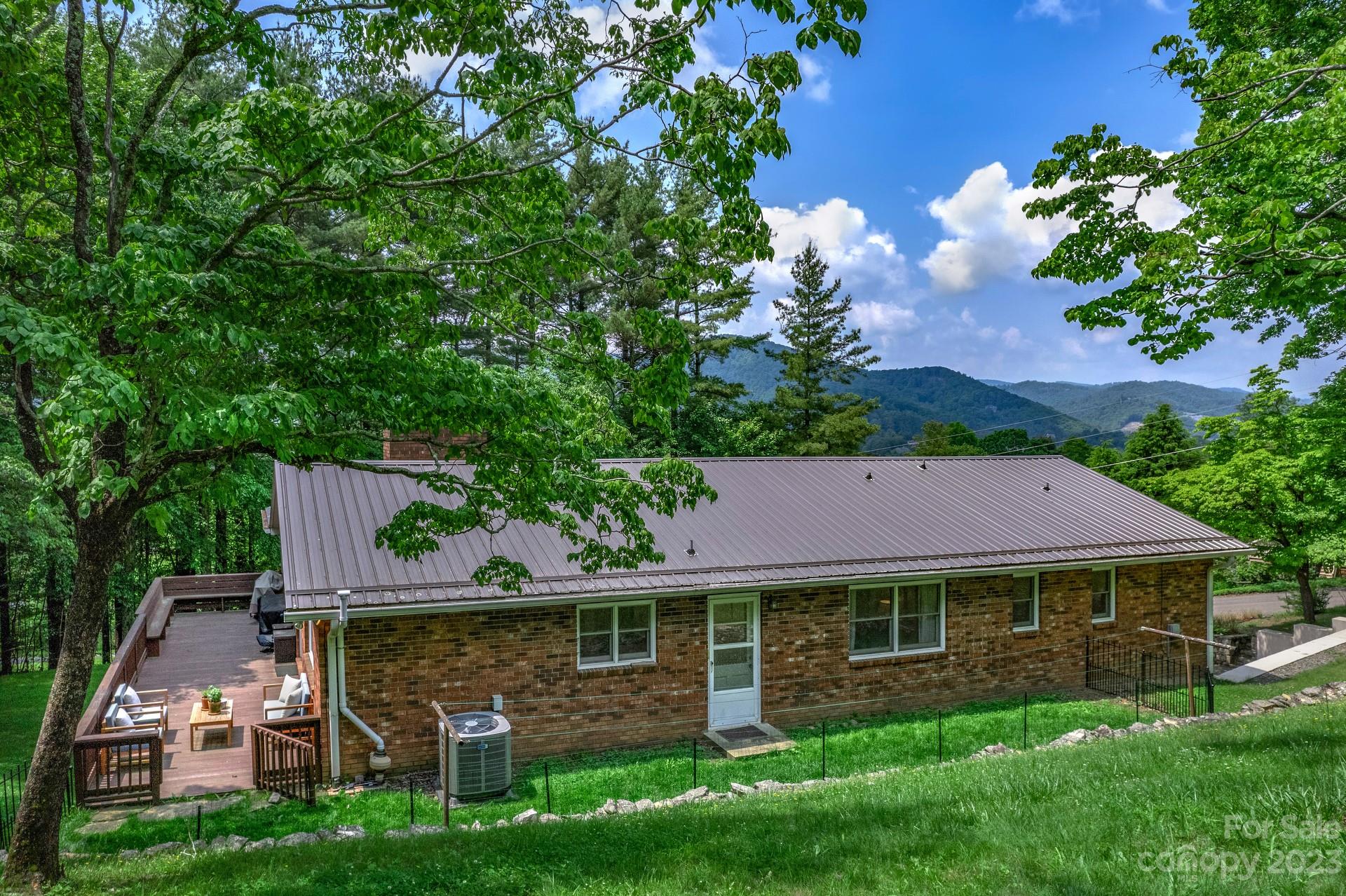 298 Camp Rock Road, Unit 14 Boone, NC 28607 - Photo 8 of 45 front view of a house with a yard