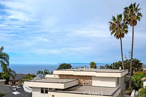 a view of a swimming pool and an outdoor seating