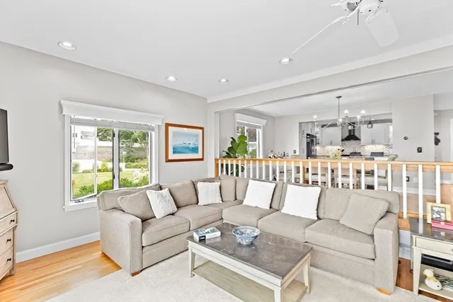 a living room with furniture and a table