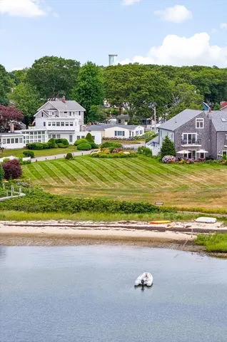 a view of a city street with a houses