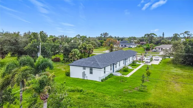 a view of a house with a big yard
