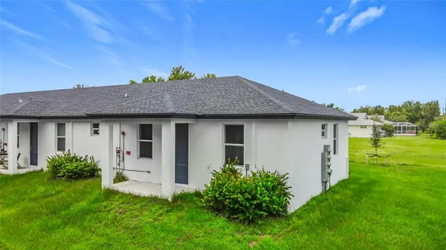 a house view with a garden space