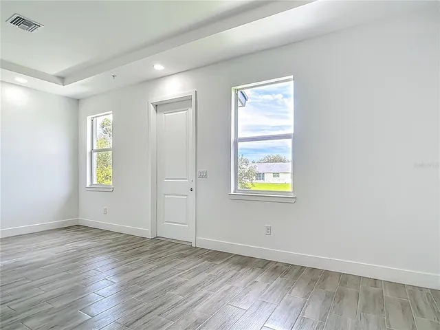 a view of an empty room and window