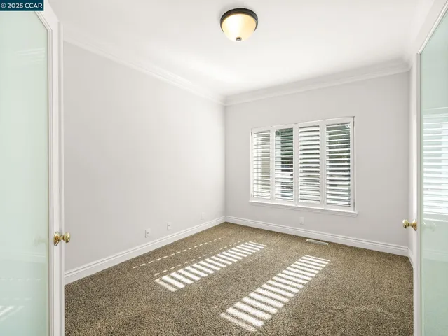 a view of a room with windows