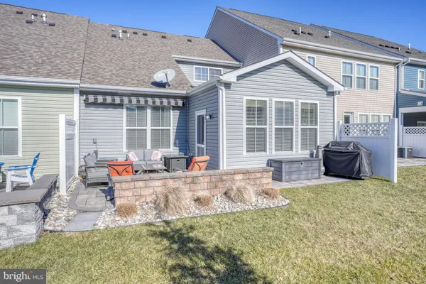 a front view of a house with patio