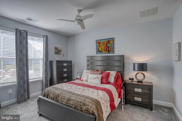 a bedroom with a bed and a closet