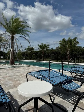a view of street with parked cars
