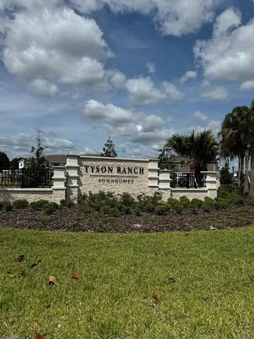 a view of a pathway with a building in the background