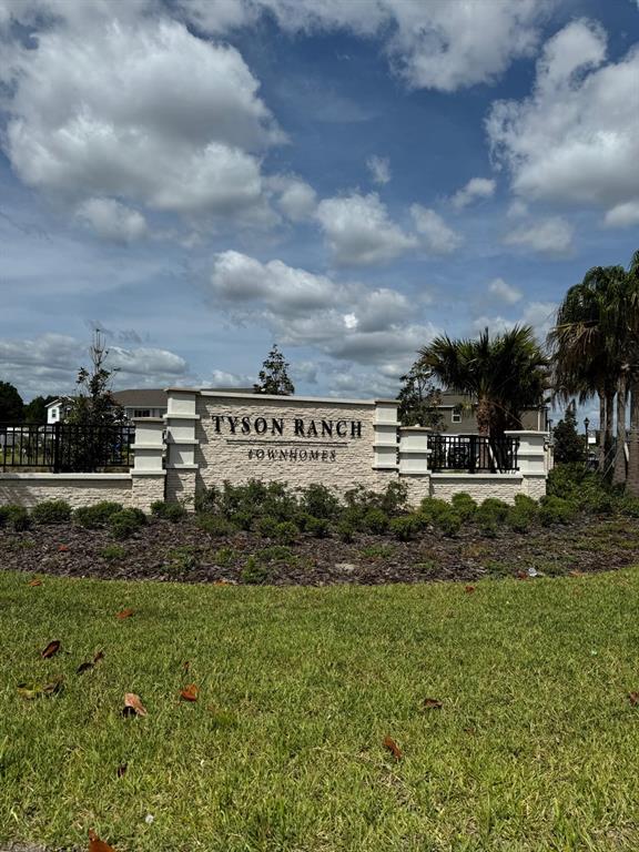 4409 Campsite Loop Orlando, FL 32824 - Photo 3 of 32 a view of a pathway with a building in the background