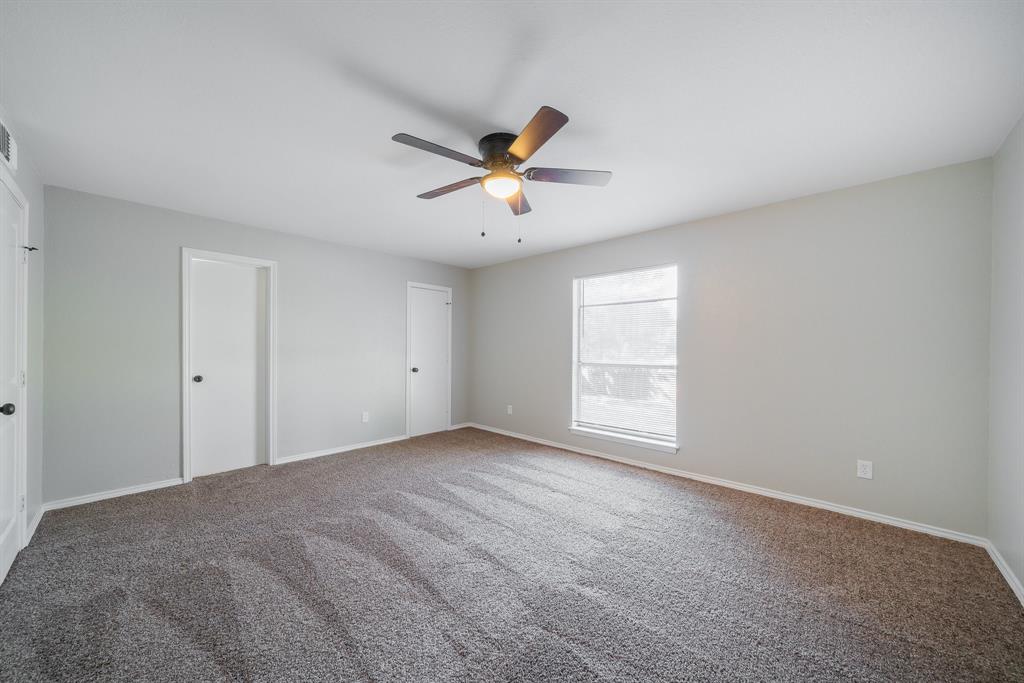3604 Biscay Drive Arlington, TX 76016 - Photo 11 of 18 a view of a room with windows and ceiling fan