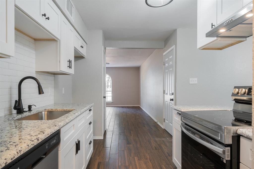 3604 Biscay Drive Arlington, TX 76016 - Photo 8 of 18 a kitchen with granite countertop a sink and stove