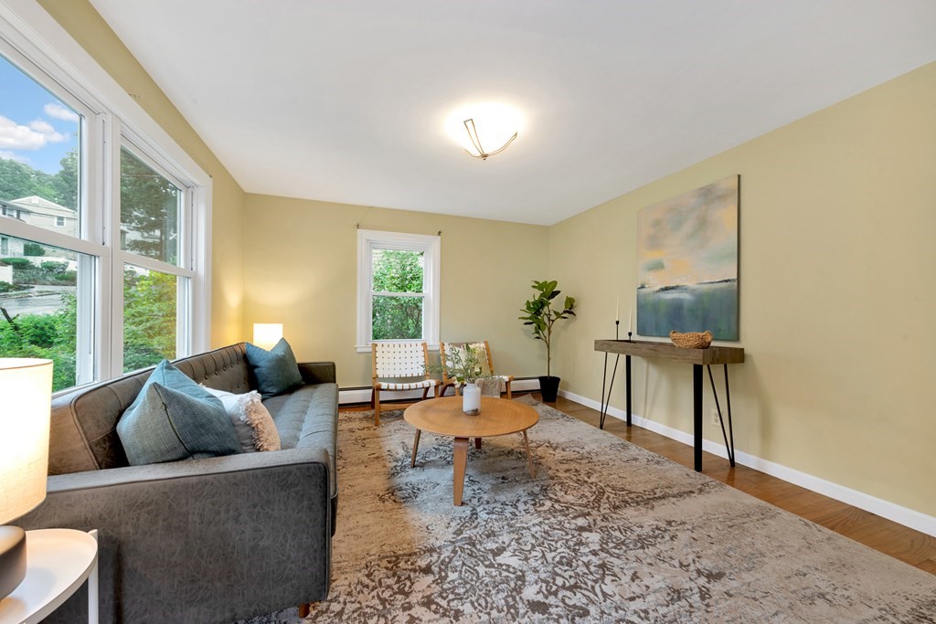 5 Grandview Road Arlington, MA 02476 - Photo 11 of 42 a living room with furniture and a large window