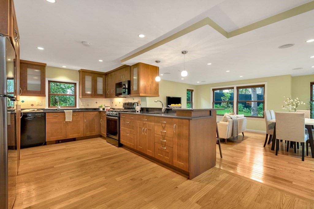 5 Grandview Road Arlington, MA 02476 - Photo 15 of 42 a kitchen with a sink a counter top space and stainless steel appliances