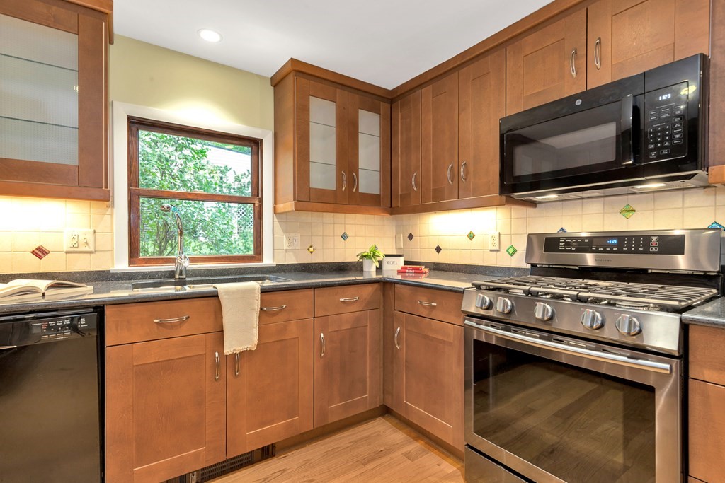 5 Grandview Road Arlington, MA 02476 - Photo 18 of 42 a kitchen with a sink stove and microwave