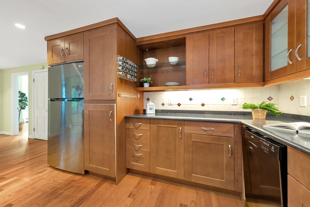 5 Grandview Road Arlington, MA 02476 - Photo 19 of 42 a kitchen with a refrigerator sink and cabinets