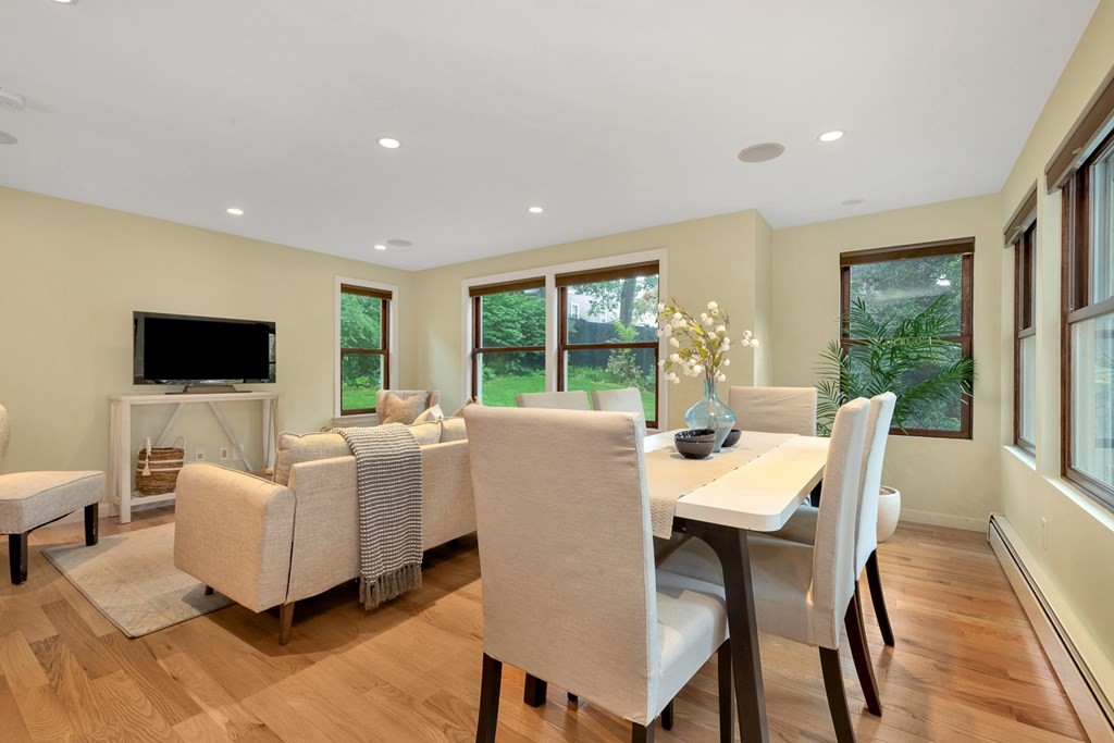 5 Grandview Road Arlington, MA 02476 - Photo 23 of 42 a living room with fireplace furniture and a flat screen tv