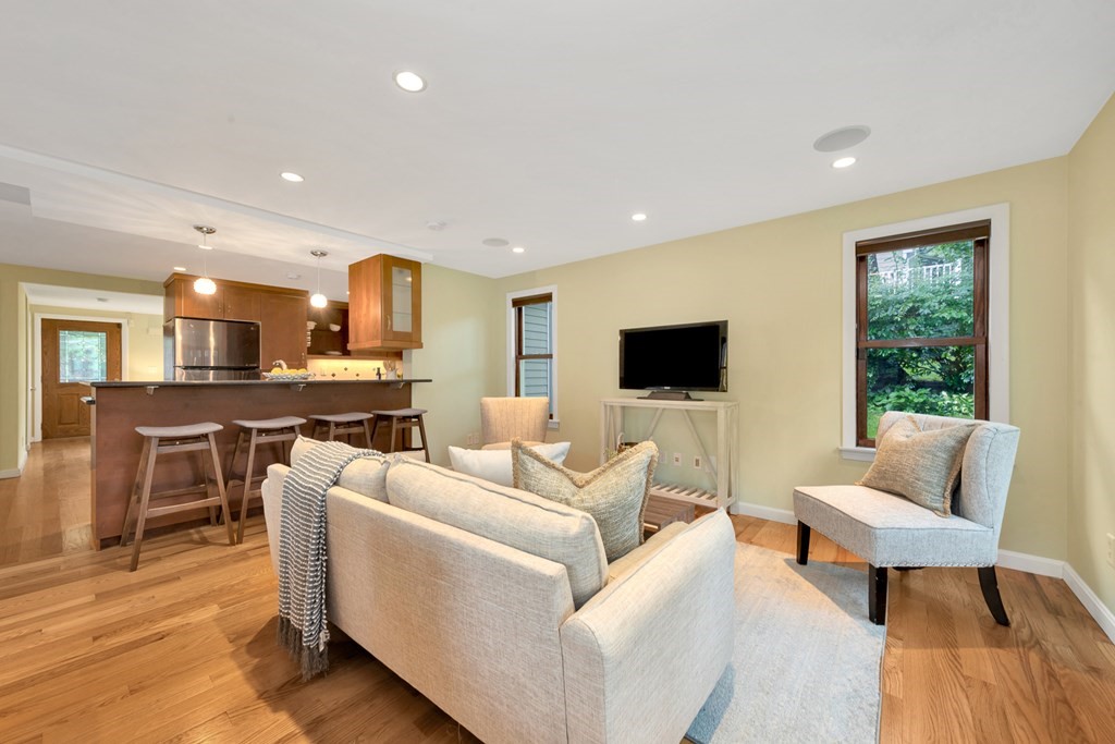 5 Grandview Road Arlington, MA 02476 - Photo 28 of 42 a living room with furniture and a flat screen tv