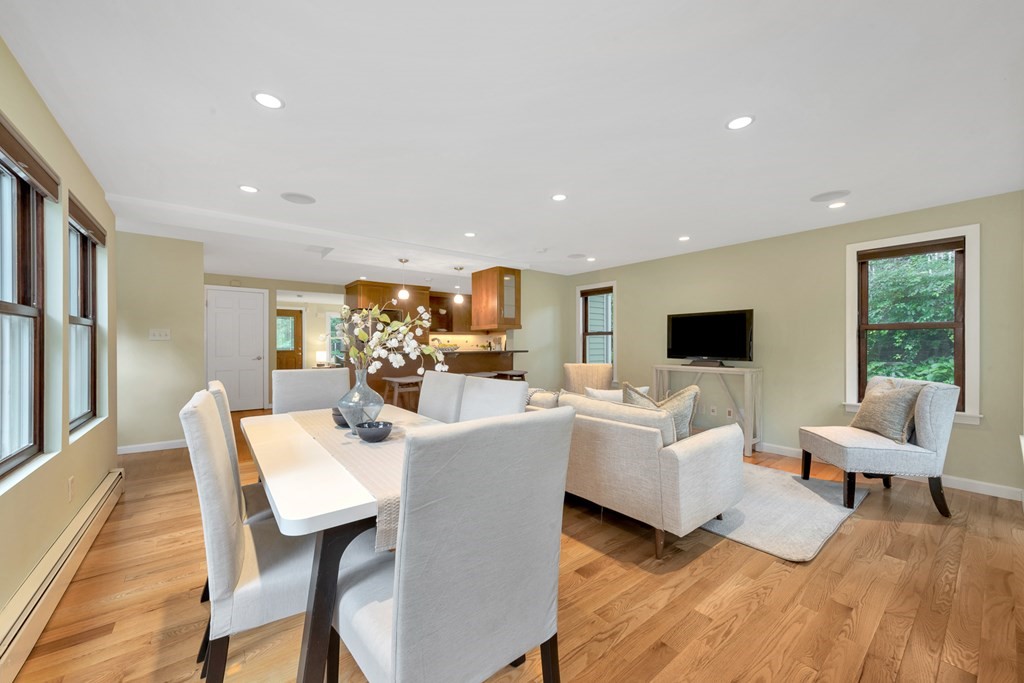 5 Grandview Road Arlington, MA 02476 - Photo 29 of 42 a living room with furniture a flat screen tv and a large window