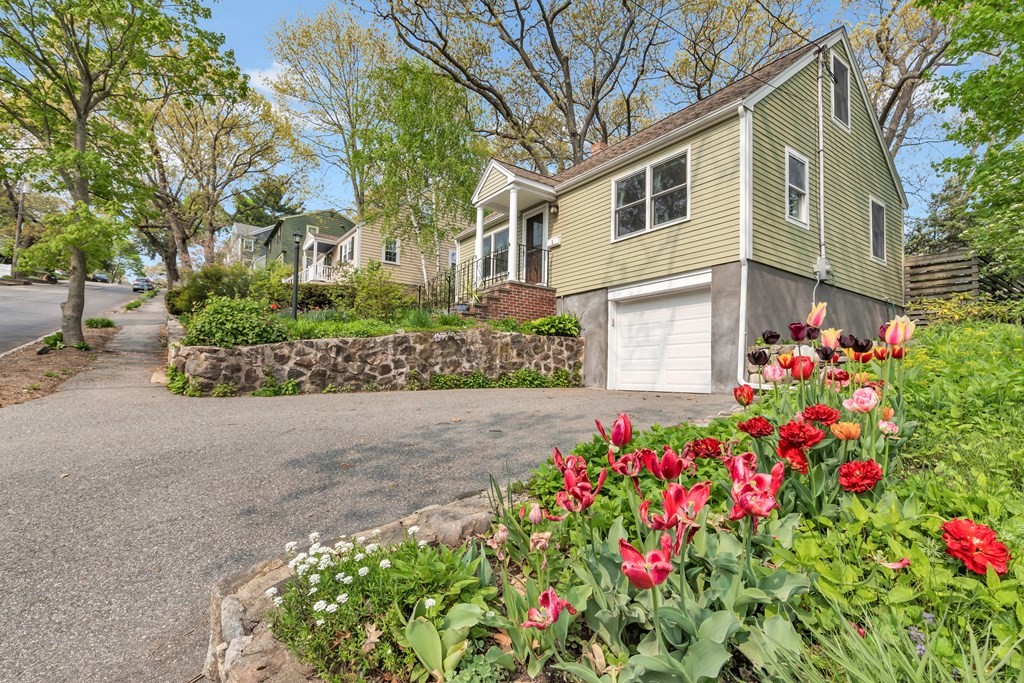 5 Grandview Road Arlington, MA 02476 - Photo 3 of 42 a flower garden is sitting in front of flowers