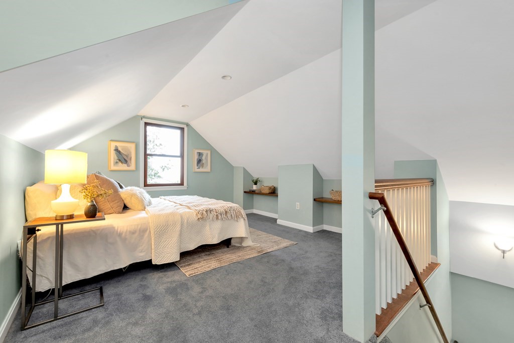 5 Grandview Road Arlington, MA 02476 - Photo 33 of 42 a bed room with a bed and a couch