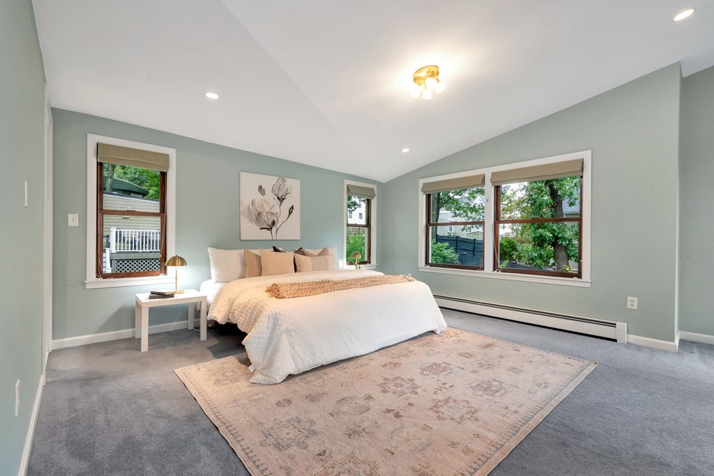 5 Grandview Road Arlington, MA 02476 - Photo 38 of 42 a bedroom with a large bed and a large window