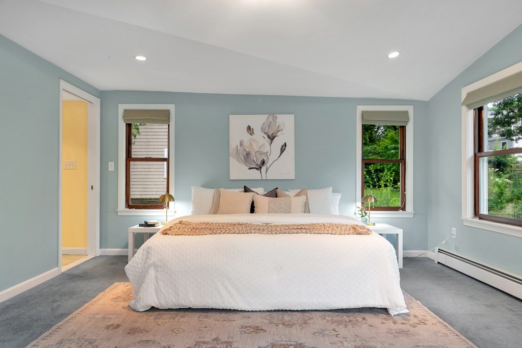 5 Grandview Road Arlington, MA 02476 - Photo 39 of 42 a bedroom with a large bed and a window