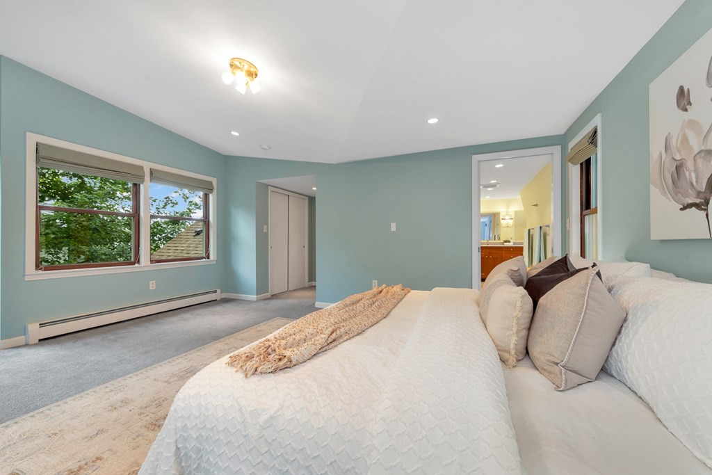 5 Grandview Road Arlington, MA 02476 - Photo 41 of 42 a bedroom with a large bed and a window