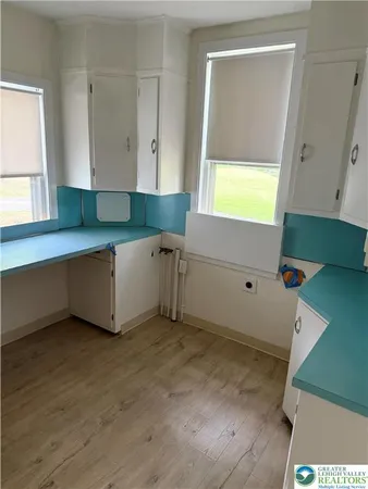 a room with window and a table