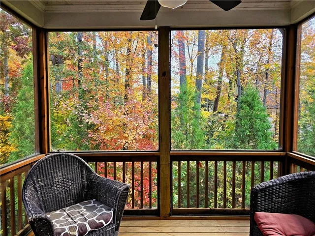 a view of roof deck with furniture
