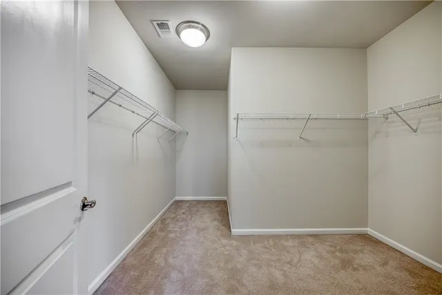 a view of a room with racks on the wall