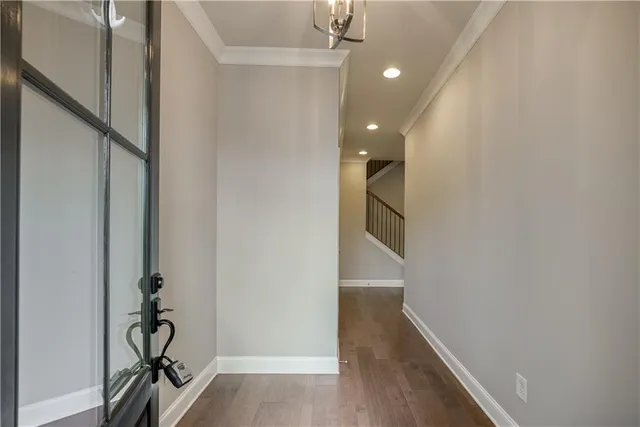 a view of entryway with wooden floor