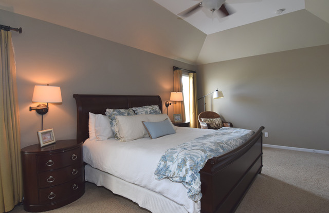 N761 Bartelt Road Geneva, IL 60134 - Photo 12 of 22 a bedroom with a bed and lamps