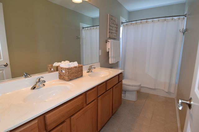 N761 Bartelt Road Geneva, IL 60134 - Photo 16 of 22 a bathroom with a sink toilet and shower