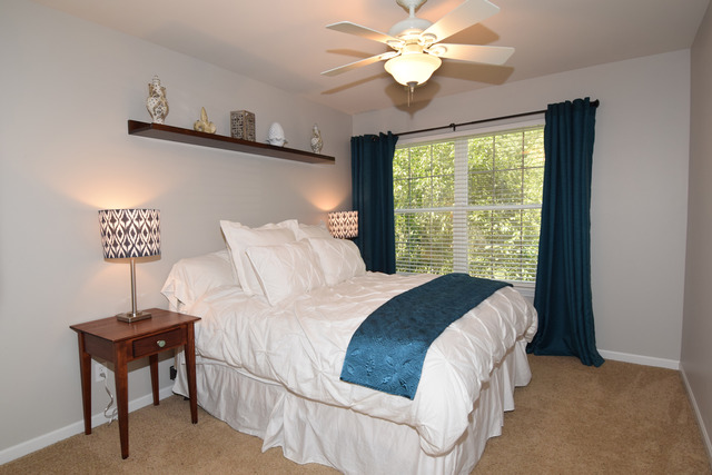 N761 Bartelt Road Geneva, IL 60134 - Photo 18 of 22 a bedroom with a bed and a large window