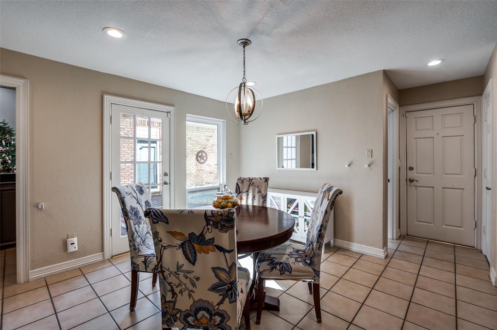 17819 Lost View Road Dallas, TX 75252 - Photo 13 of 39 Breakfast area looks out to pool area