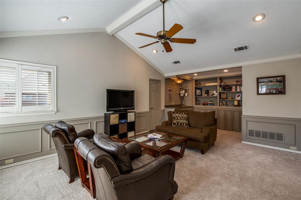 17819 Lost View Road Dallas, TX 75252 - Photo 27 of 39 Upstairs living with built ins