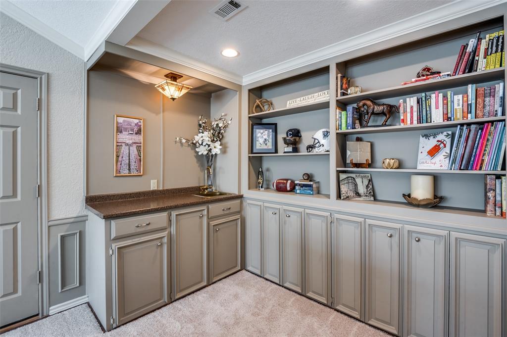 17819 Lost View Road Dallas, TX 75252 - Photo 28 of 39 Built in's in upstairs living area