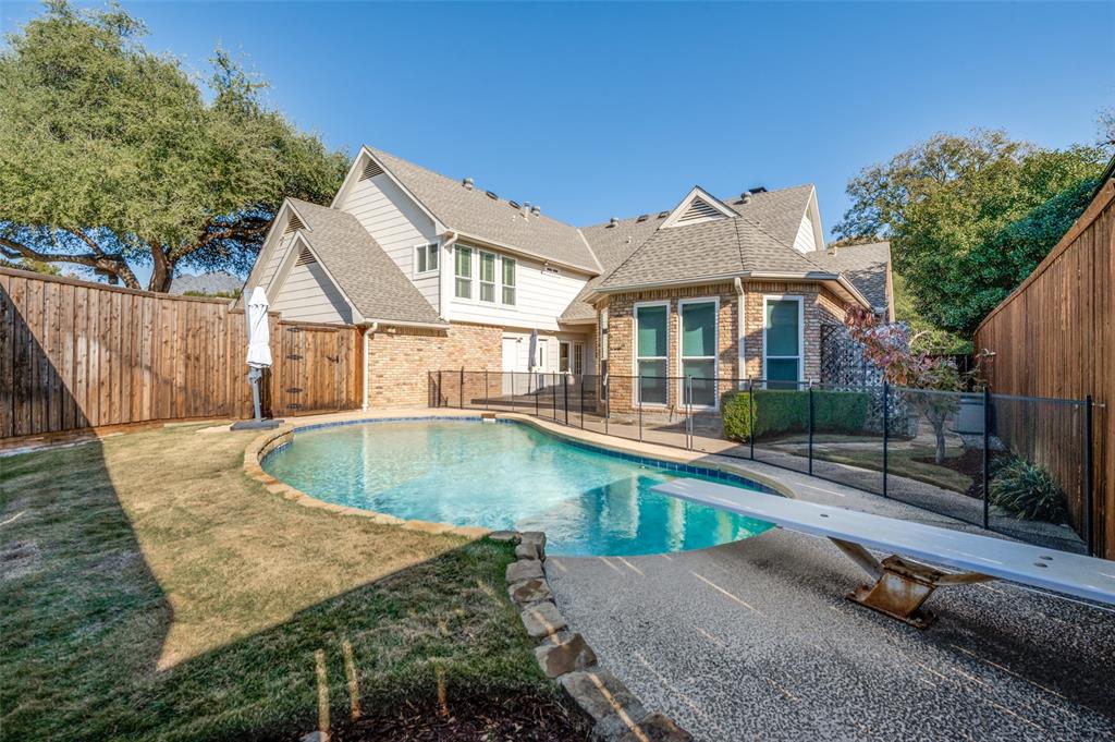 17819 Lost View Road Dallas, TX 75252 - Photo 36 of 39 Pool with grass area