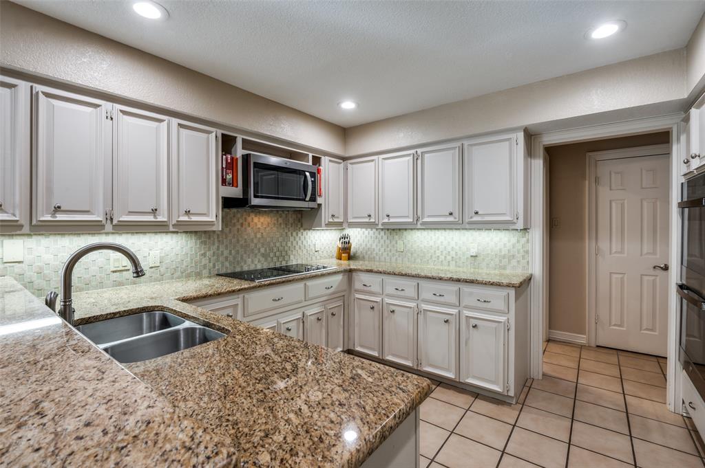 17819 Lost View Road Dallas, TX 75252 - Photo 9 of 39 Kitchen with built in microwave and double ovens