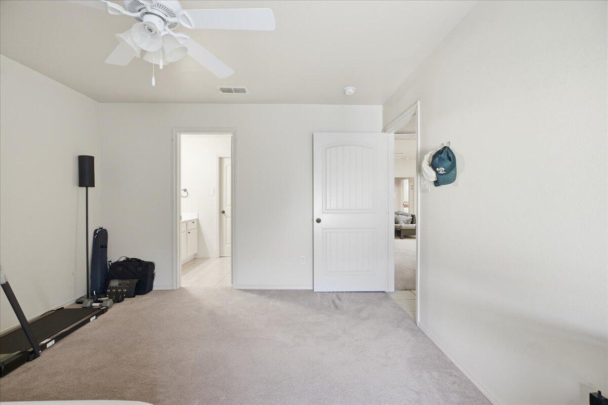 3118 113th Street Lubbock, TX 79423 - Photo 19 of 21 a view of a room with window and cabinet