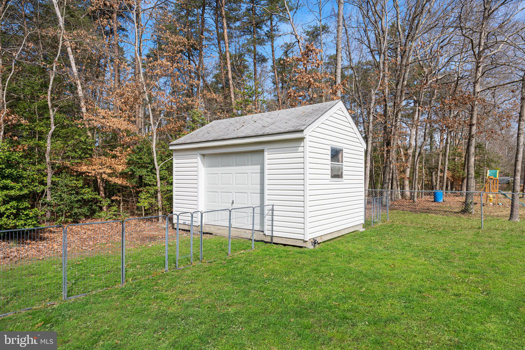 5423 South Branch Road Fredericksburg, VA 22407 - Photo 22 of 25 Large storage shed to hold all lawn gear
