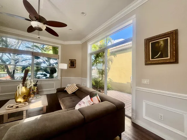a view of a chair and table in the patio